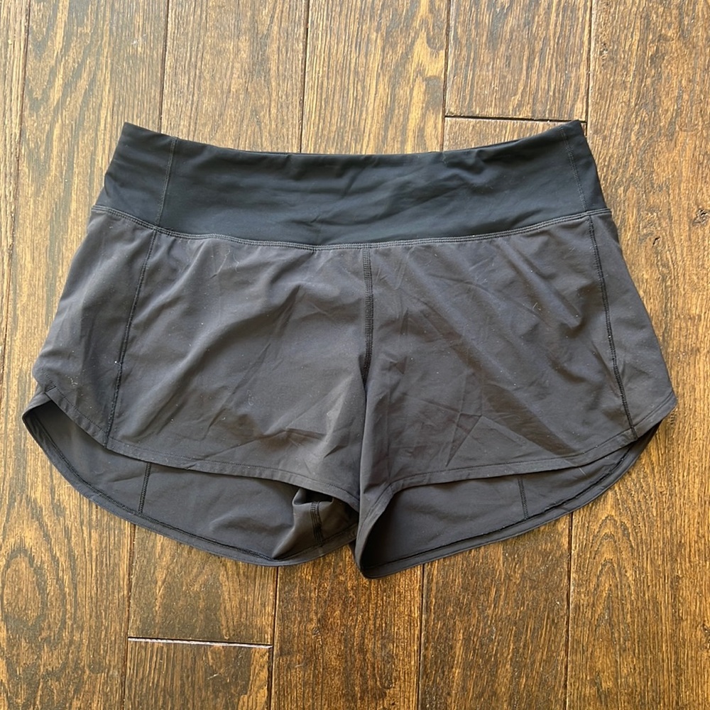 Lululemon speed up shorts black mid rise size 6